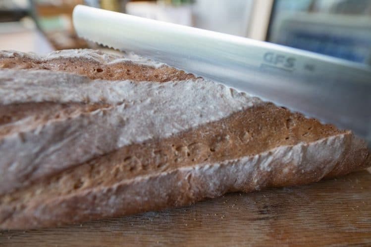 MacReady Artisan Bread Company- Cutting bread